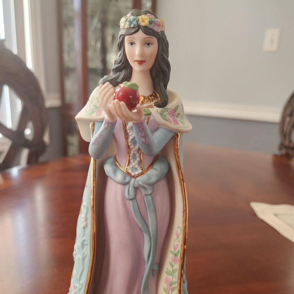 Elegant Princess Figurine with Apple